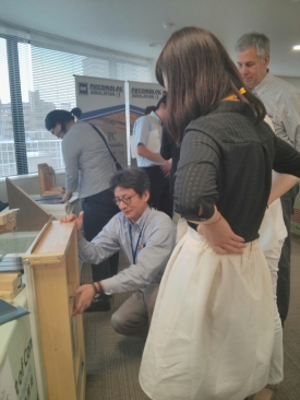 A Marvin windows rep shows off a product during a U.S. trade seminar in Japan