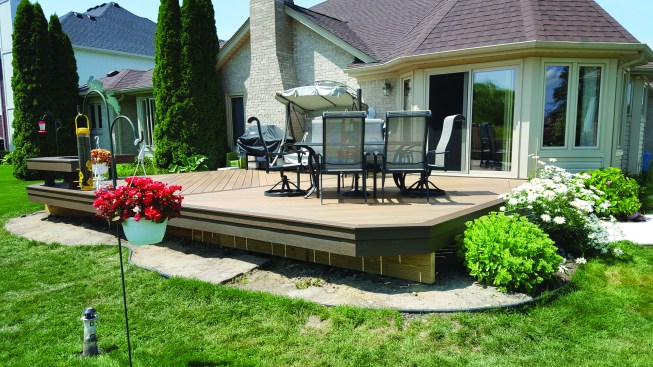 The deck has a tiered fascia detail, which makes the edge of the deck appear narrower.