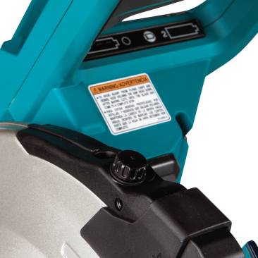Onboard battery gauge. The saw has an onboard battery gauge tucked just behind the power switch. A knob on top fo the blade housing allows you to adjust the positioning of the laser line in relation to the saw kerf.