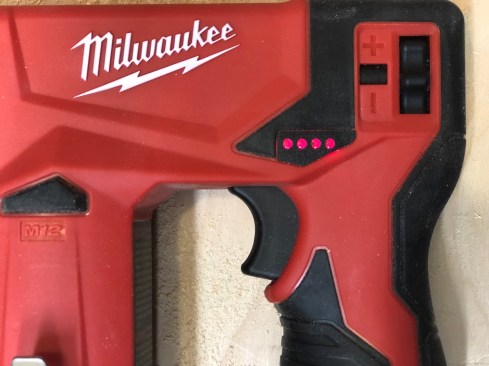 A power adjustment knob allows you to dial in the depth of drive for fastners based on length and the material you're going into. A  fuel gauge tells you the battery level as its losing charge.