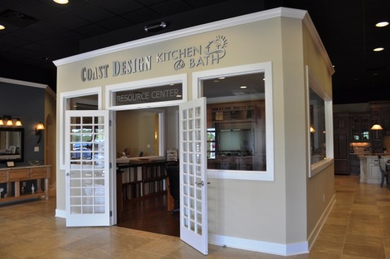 The Resource Center is located in the center of the showroom, and it includes a flat screen television showroom designers can use to display a homeonwer's kitchen and talk about potential changes.