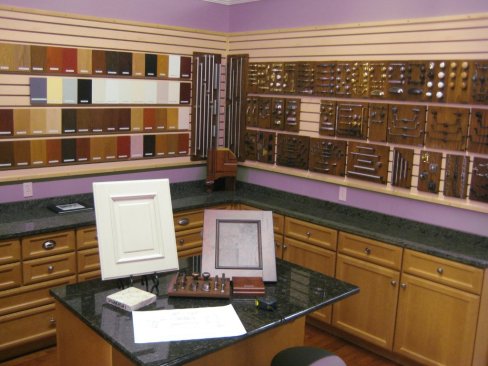 Organized wall space also allows the manufacturer to display a number of hardware and cabinet door options.