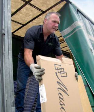 Randy Henderson's entire delivery to Lincoln Creek Lumber in Centralia, Wash., consisted of one door slab. Distributors figure a stop costs them money unless they can generate at least $150 gross profit. In this case, Huttig didn't, but it makes up for that loss with bigger deliveries to the customer on other days.