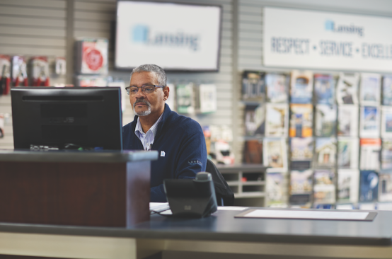 Carlton "Boe" Watkins, inside sales representative, at one of Lansing's 77 branches.