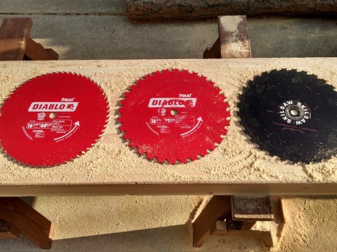 The author tested the saw using both fine-cut 60-tooth (left) and rough-cut 32-tooth (middle)  Freud Diablo blades. The saw comes with a standard 32-tooth Skilsaw blade (right).