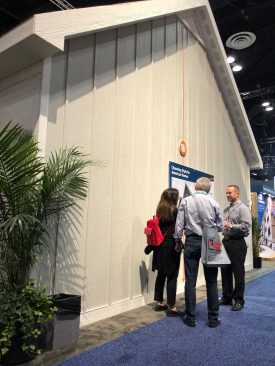 The new cedar texture vertical siding from LP’s SmartSide group comes in lengths of up to 16 feet by 4 feet.