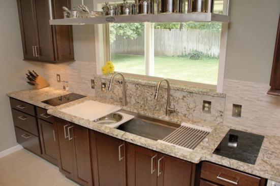 The Galley Sink's two sliding tiers incorporate cutting boards, colanders, a drying rack, and stainless steel bowls along with useable stainless steel sink space and storage for dirty dishes. The sink is available in 7-foot; 5- and �-foot; and 4-foot lengths, and as an undermount or apron front with granite, marble, or wood surface options. 918.794.2700.  www.thegalleysink.com.