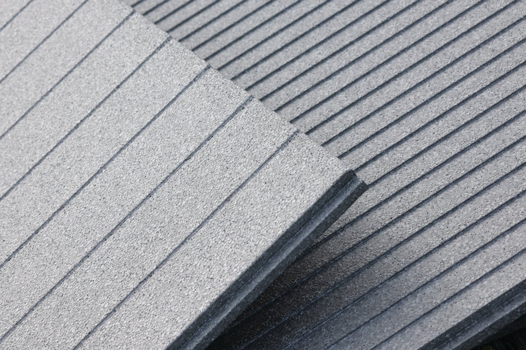 Progressive Foam’s Halfback H20 Premium Series insulation uses BASF’s Neopor thermal foam, whose graphite particles boost R-value. A 3.5-perm rating prevents thermal bridging without trapping water vapor, while grooves on the panels’ backing direct moisture down and out the bottom of the wall to improve drying. Progressive Foam,www.progressivefoam.com; 800.860.3626.