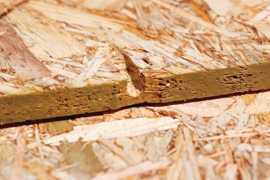 Weyerhaeuser's Edge Gold flooring panels feature small grooves on one edge to help rainwater drain at the jobsite.