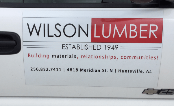 A truck on the side of one of Wilson Lumber's trucks